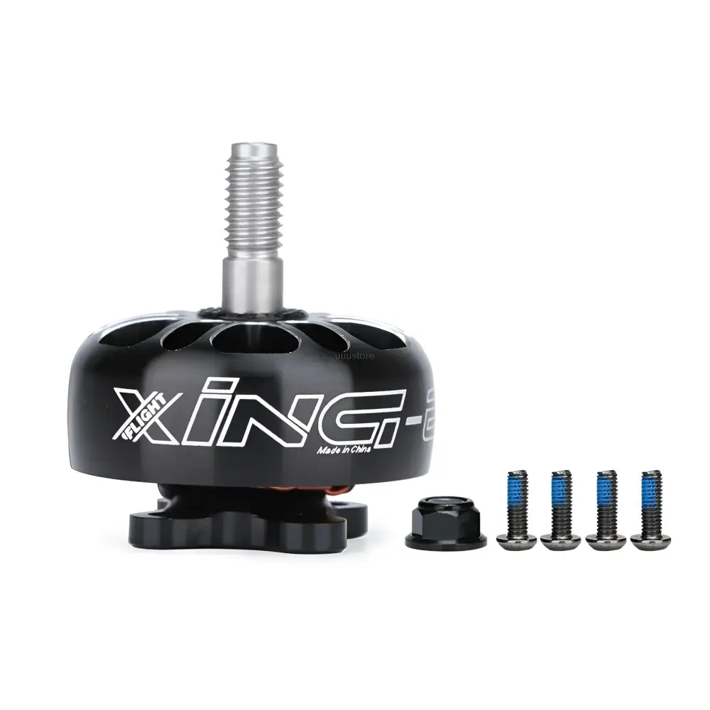 Brushless motor with ’XING’ branding and accompanying mounting screws.